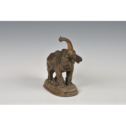 1186 - A realistically modeled copper elephant figureprobably early 20th century, modelled with raised trun... 