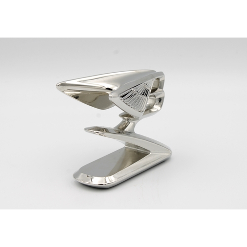 1069 - A chromium plated forward leaning double winged Bentley "B" car mascot6.5cm. high.