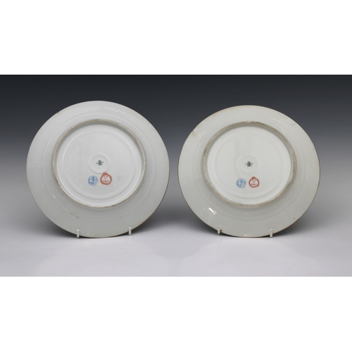 2000 - A pair of mid 19th century Sevres Chateau de Dreux porcelain cabinet plates, with a bleu celeste gro... 