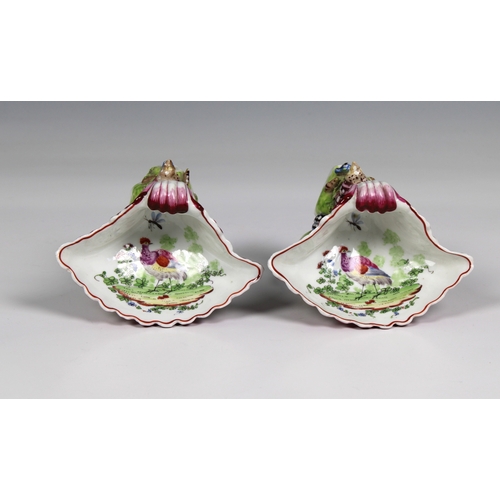 2003 - A pair of Bow porcelain sweetmeat stands circa 1765 in the form of upturned scallop shells, nestled ... 