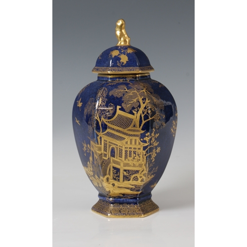 2035 - A Carlton Ware, Wiltshaw & Robinson, Stoke on Trent, hexagonal porcelain lidded temple jar, in the M... 