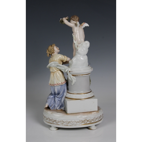 2088 - A 20th century Karl Ens, Volkstedt, Germany, porcelain figure group of Cupid and Psyche, Cupid stand... 