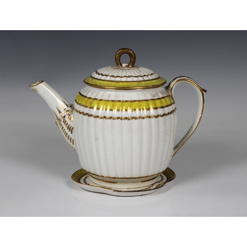 2115 - An early 19th century Crown Derby fluted teapot and stand, yellow ground with gilded decoration, fac... 