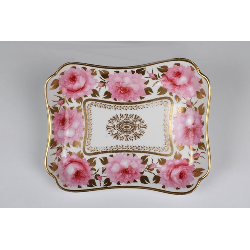 2119 - A Davenport porcelain serving dish, rectanguler with inverted corners, polychrome decoration of pink... 