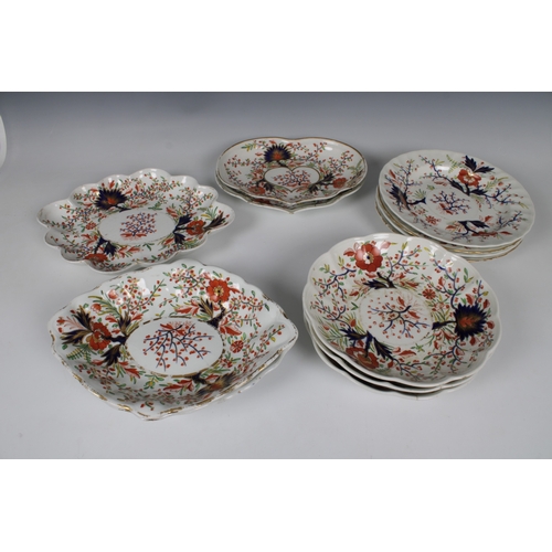 2123 - Four early 19th century Crown Derby Imari pattern plates, 23.8cm. diameter, together with three simi... 