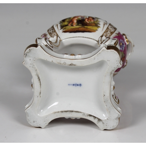 2124 - A KPM Berlin porcelain twin handled pott pourri vase and cover and four legged stand, above a cushio... 