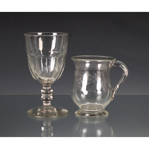 2136 - A 19th century engraved glass tankard / mug, of baluster form with engraved bow & swag decoration, a... 