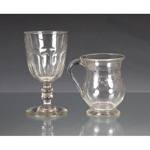 2136 - A 19th century engraved glass tankard / mug, of baluster form with engraved bow & swag decoration, a... 