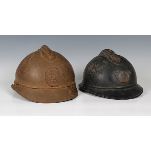 2153 - Belgium M-15 type Adrian Steel Helmet, with lion head badge, with liner, together with a French Adri... 