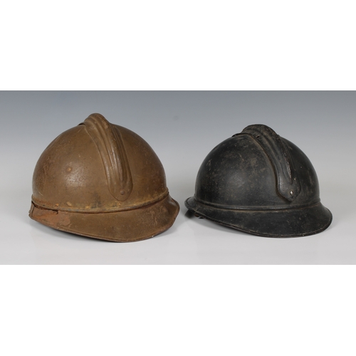 2153 - Belgium M-15 type Adrian Steel Helmet, with lion head badge, with liner, together with a French Adri... 