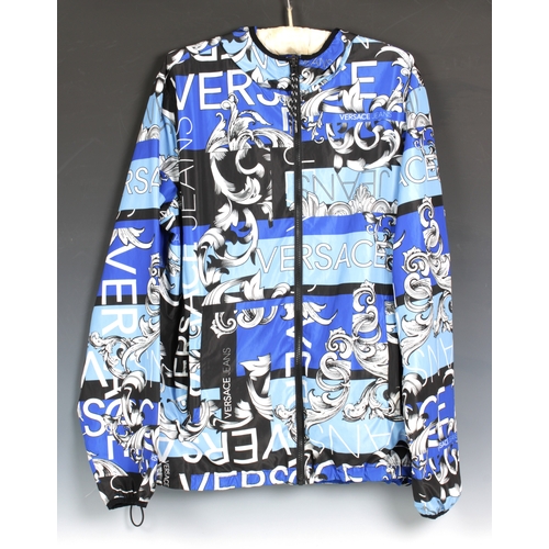 2234 - VERSACE JEANS unisex Blue reversible print Bernini jacket, featuring a versatile fully reversible de... 