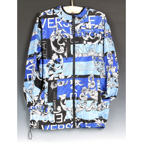 2234 - VERSACE JEANS unisex Blue reversible print Bernini jacket, featuring a versatile fully reversible de... 