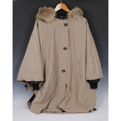 2238 - NINA RICCI poncho trench coat from her Evolution collection, in classic khaki, lined in a dark grey ... 