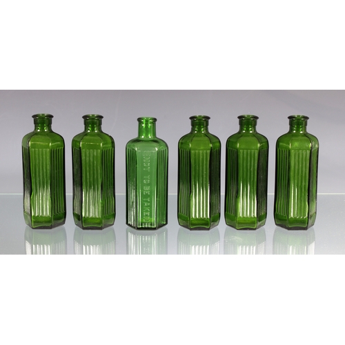 2260 - A set of six green hexagonal poison bottles, on marked 'NOT TO BE TAKEN', each having three ribbed s... 