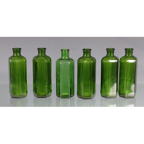 2260 - A set of six green hexagonal poison bottles, on marked 'NOT TO BE TAKEN', each having three ribbed s... 