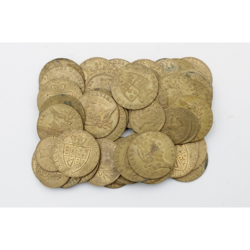 2264 - A collection of fifty-six Georgian and Victorian metal gambling tokens, comprising forty-four spade ... 