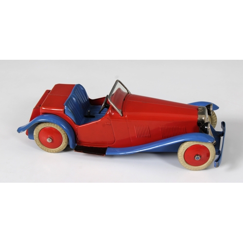 2360 - Meccano clockwork tinplate Two-Seater Sports Car, with red body and hubs and blue wheel arches, bump... 