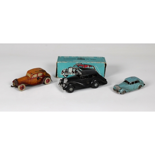 2458 - Three Mechanical Clockwork toy cars - To include a boxed Chad Valley Wee-Kin Police car, together wi... 