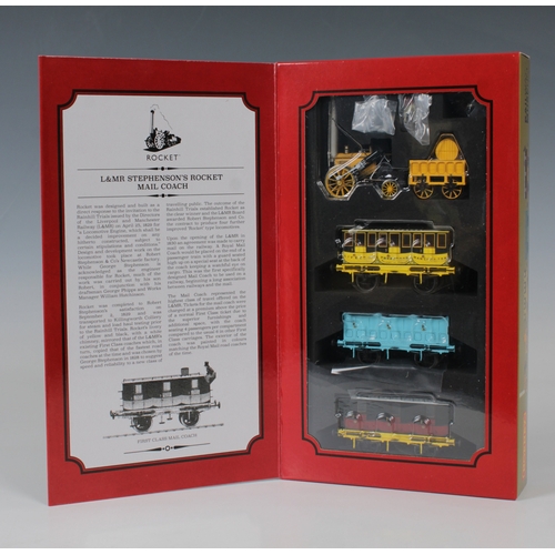 2474 - Hornby 'OO' Gauge R3956 L&MR Stephenson's Rocket Mail Coach Train Pack.,