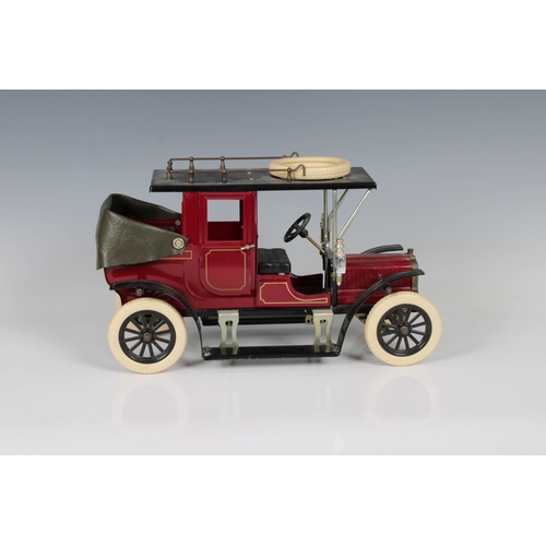 2496 - A tin plate limited edition Jan Blenken (JB Models) model vintage car, inscribed "limited editi... 