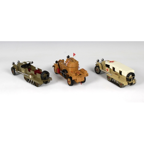 2498 - Three HECO tinplate military model vehicles 1:32 scale, model No.62993 military finish military trac... 