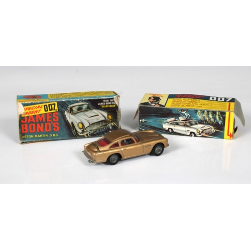 2502 - Corgi Toys 261 James Bond's 007 Aston Martin D.B.5, with figures, good playworn condition, inner dis... 