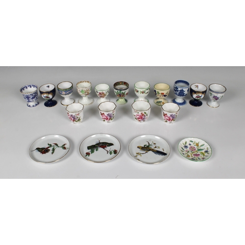 2049 - A collection of fifteen ceramic egg cups, mostly 20th century, comprising a pair of Spode Copeland c... 