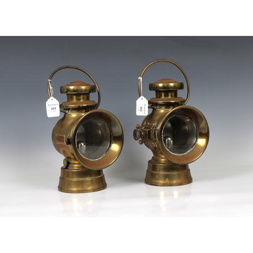 1082 - A pair of early 20th century Lucas brass oil automobile lightsclear glass to the front, red glass to... 