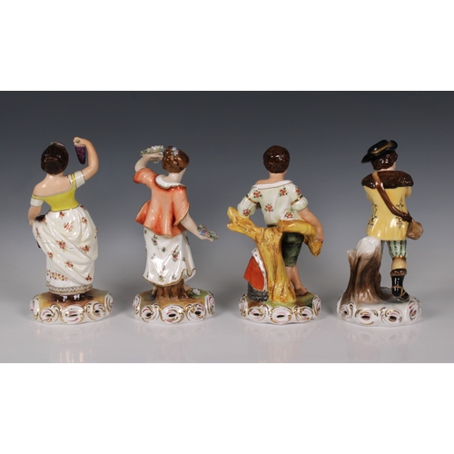 2014 - A set of four boxed Royal Crown Derby figurines 'The Seasons', comprising Spring - a young woman wit... 