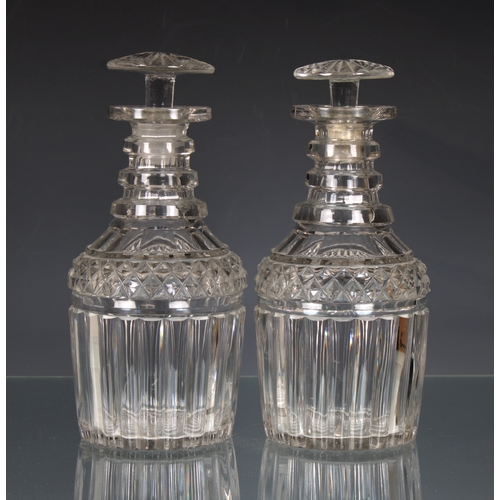 2134 - A pair of Georgian cut glass decanters, 22cm high.