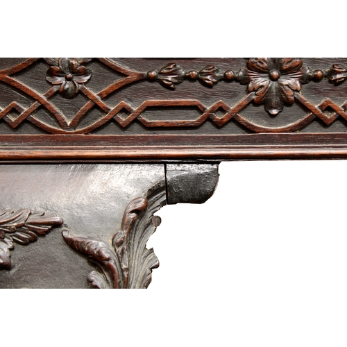 60 - A George III carved mahogany silver tablethe rectangular top with fretwork above a carved frieze on ... 