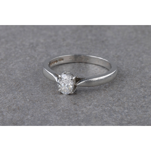 728A - A platinum and diamond solitaire ring,