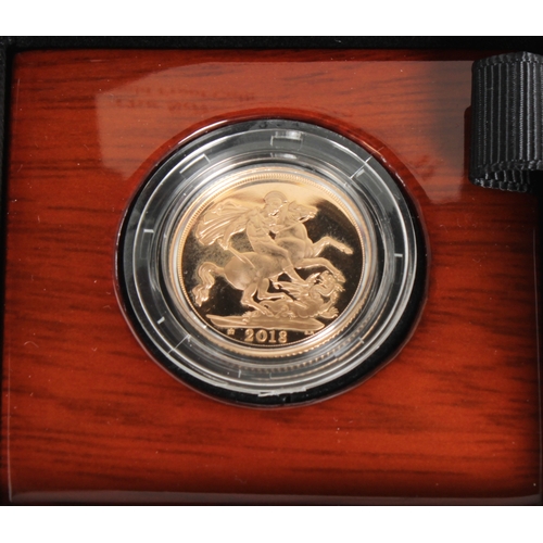 62 - An Elizabeth II Proof Sovereign, bust obverse, reverse George and the Dragon, dated 2018, in plastic... 