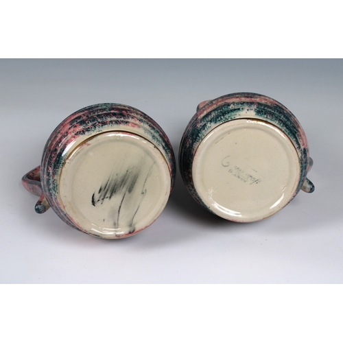 112 - A pair of 20th century Govancroft, Glasgow pottery lustre jugs mark beneath, 6 1/2 in. (16.5cm.) hig... 