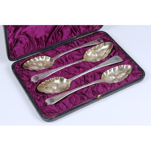 133 - A cased matched set of four George III silver berry spoons William Eley I, William Fearn & William C... 