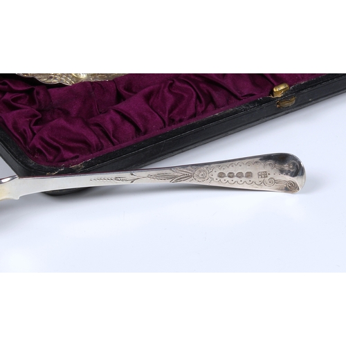 133 - A cased matched set of four George III silver berry spoons William Eley I, William Fearn & William C... 