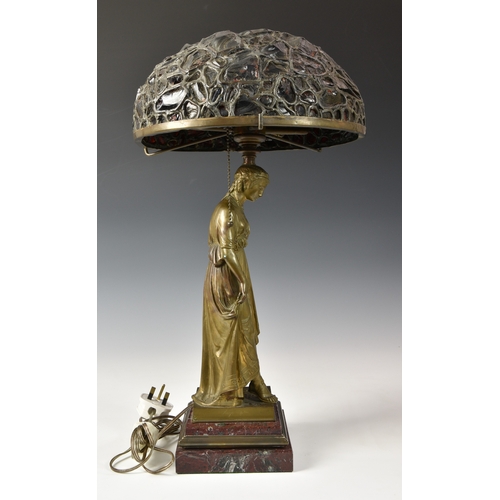 145 - After Francois Mage (French, d.1910) A Tiffany style classical maiden bronze table lamp, raised on s... 