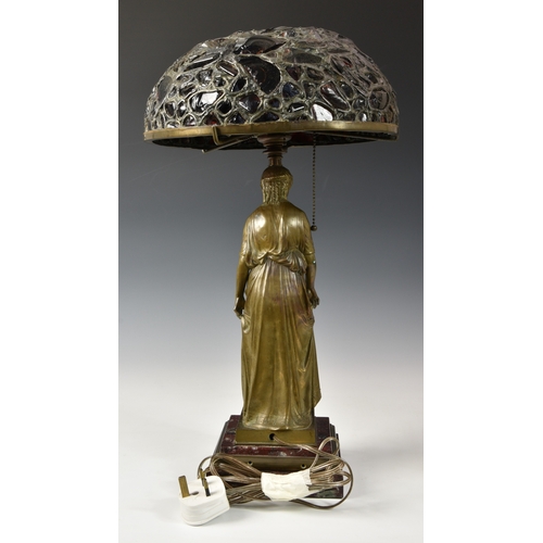 145 - After Francois Mage (French, d.1910) A Tiffany style classical maiden bronze table lamp, raised on s... 