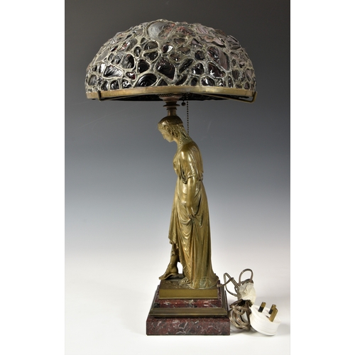 145 - After Francois Mage (French, d.1910) A Tiffany style classical maiden bronze table lamp, raised on s... 