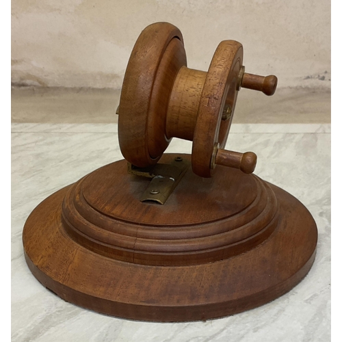 176 - A vintage treen fishing reel winder.