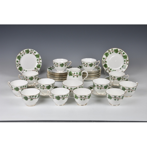 178 - A Crown Staffordshire part tea service for twelve place settings, in the Green Vine pattern, printed... 