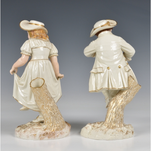 205 - A pair of Royal Worcester figural spill vases circa 1885 in the form of a young couple, the girl wea... 