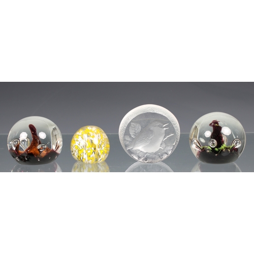 209 - Collection of twelve glass paperweights of various forms, including four by Baccarat of members of t... 