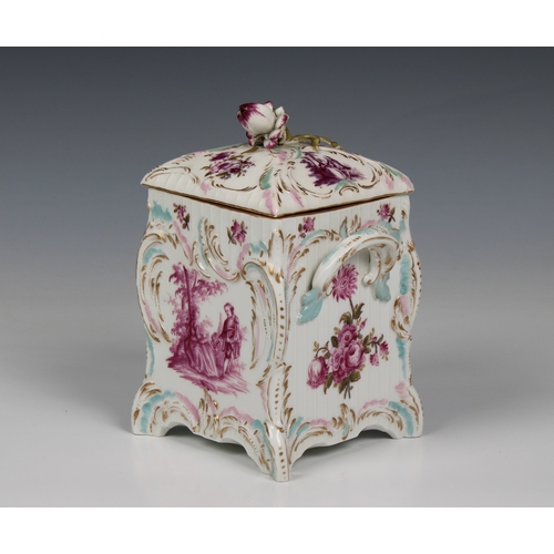 216 - A KPM Berlin porcelain Rococo style lidded knaster box having a rosebud finial, two applied handles ... 