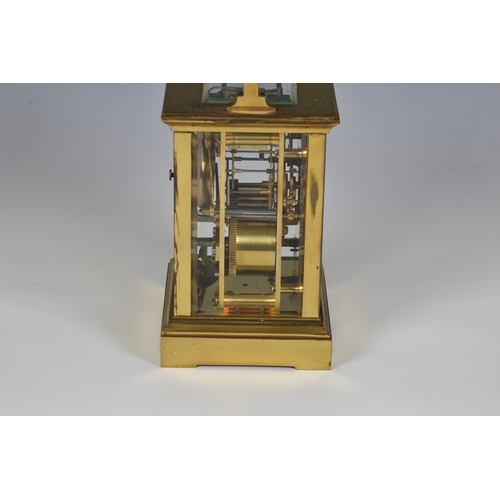 227 - A French gilt brass carriage clock early 20th century, signed to the white, Roman enamel dial by the... 