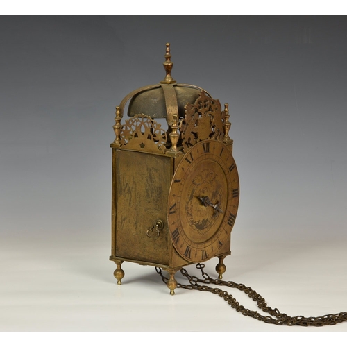 23 - A late 19th century lantern clock in the 17th century style, the four pillar, weight driven movement... 