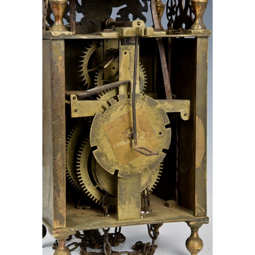 23 - A late 19th century lantern clock in the 17th century style, the four pillar, weight driven movement... 