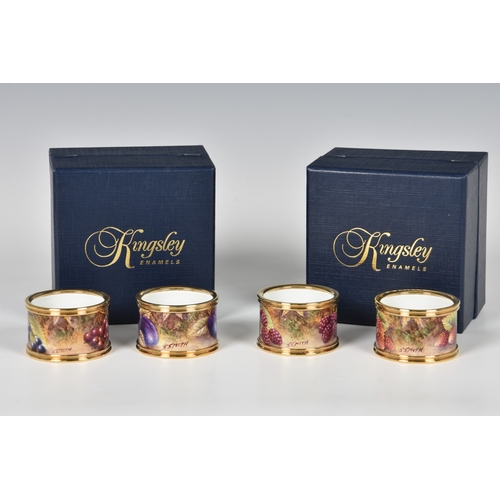 246 - Two boxed pairs of Kingsley Enamels napkin rings by S. Smith hand painted in enamels with fruit, sig... 