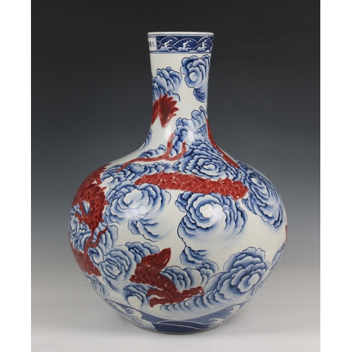 314 - A large Chinese porcelain bottle vase 19th / 20th century, ovoid body rising from recessed unglazed ... 