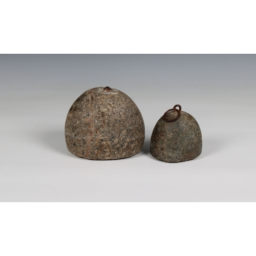 317 - Two small granite corn weights one engraved "2" with iron ring, the other engraved "6... 